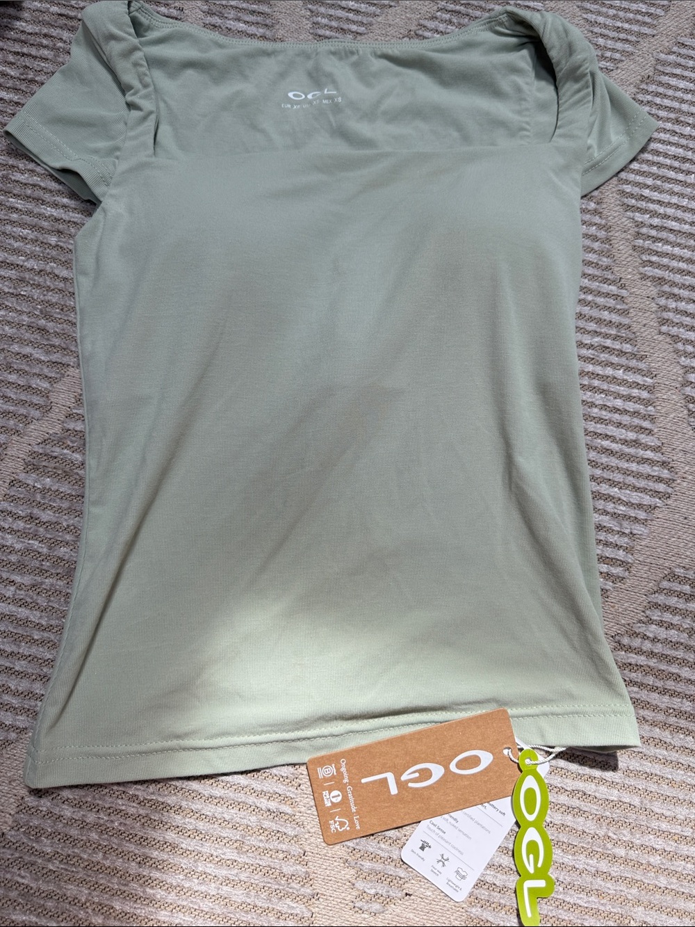 OGL Sage Green Women’s Short Sleeve Top with attached bra pads